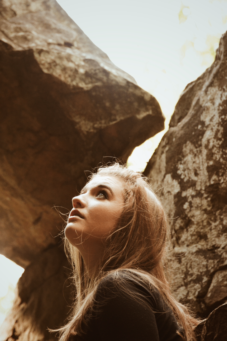 Portrait between sunlit rocks